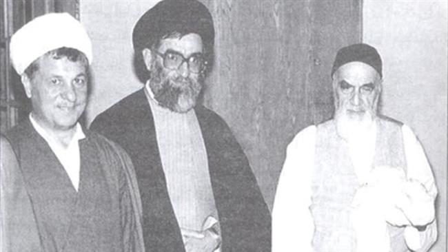 This file photo shwos Ayatollah Akbar Hashemi Rafsanjani (L) standing next to Leader of the Islamic Revolution Ayatollah Seyyed Ali Khamenei (C) and late founder of the Islamic Republic Imam Khomeini.